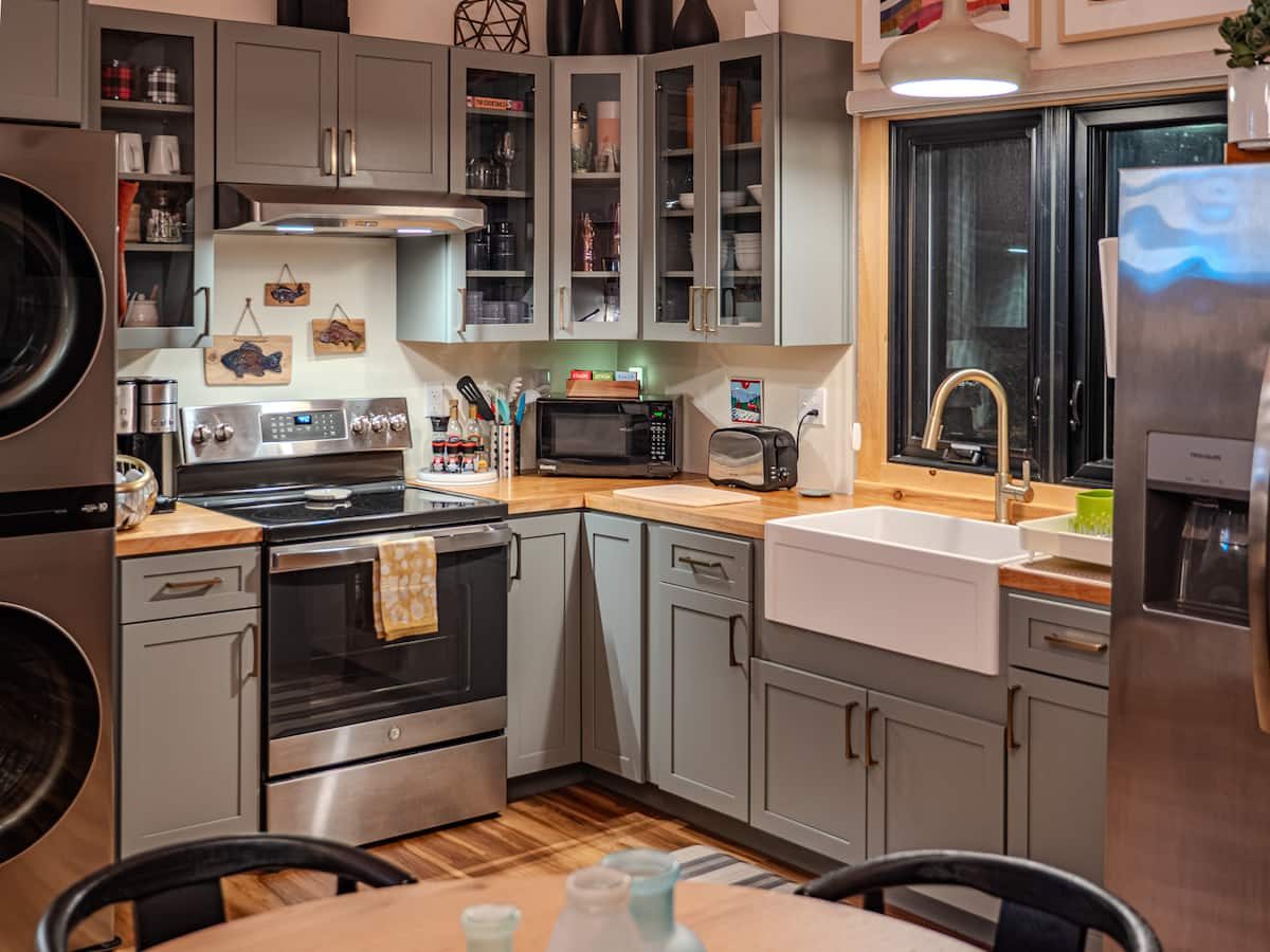 Kitchen with butcher block counters and farmhouse sink